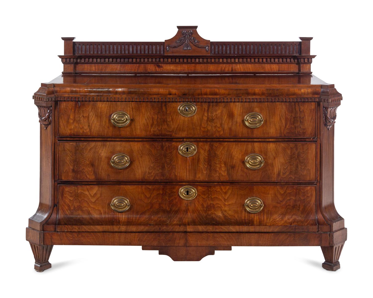 A Northern European Neoclassical Walnut Commode