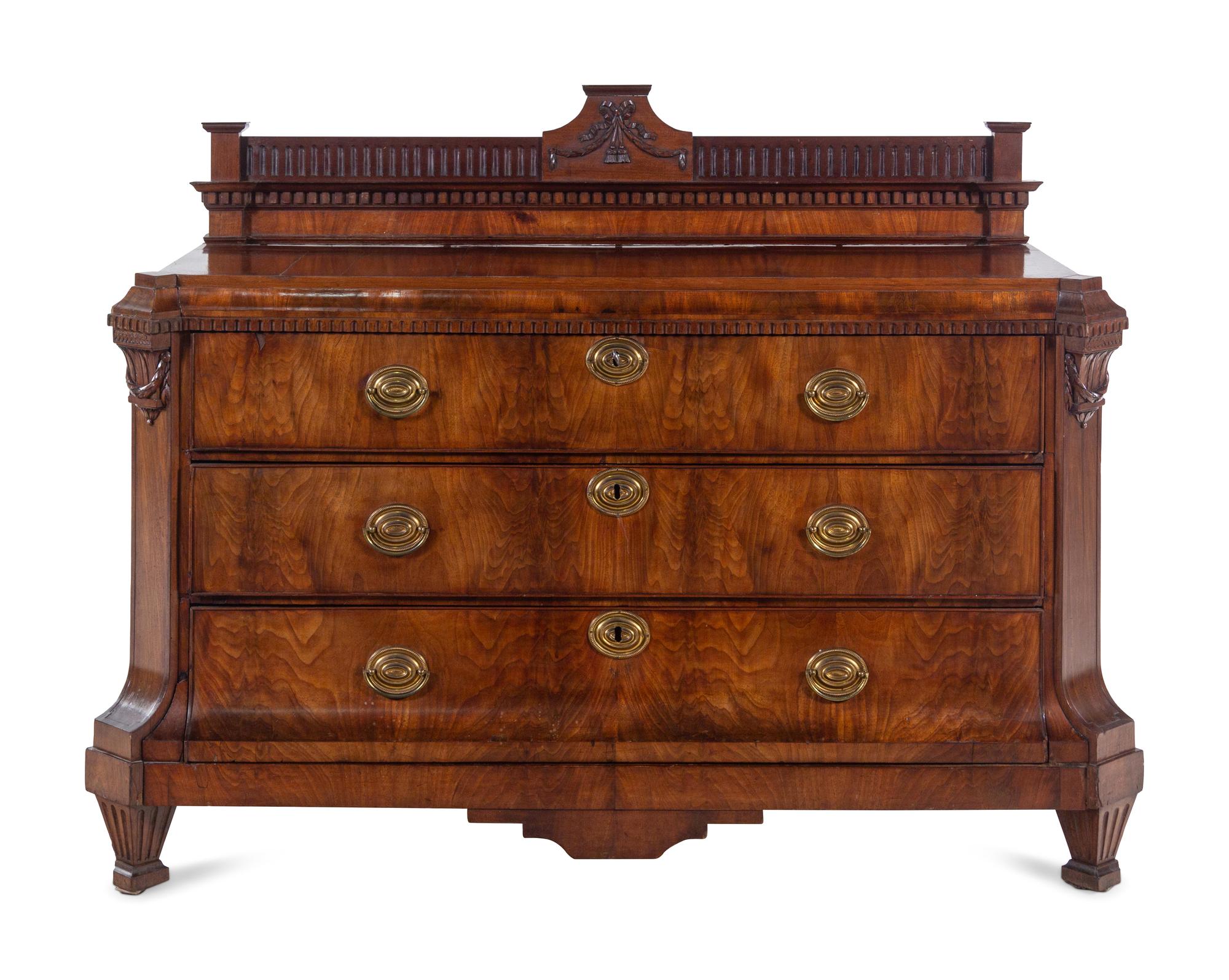 A Northern European Neoclassical Walnut Commode