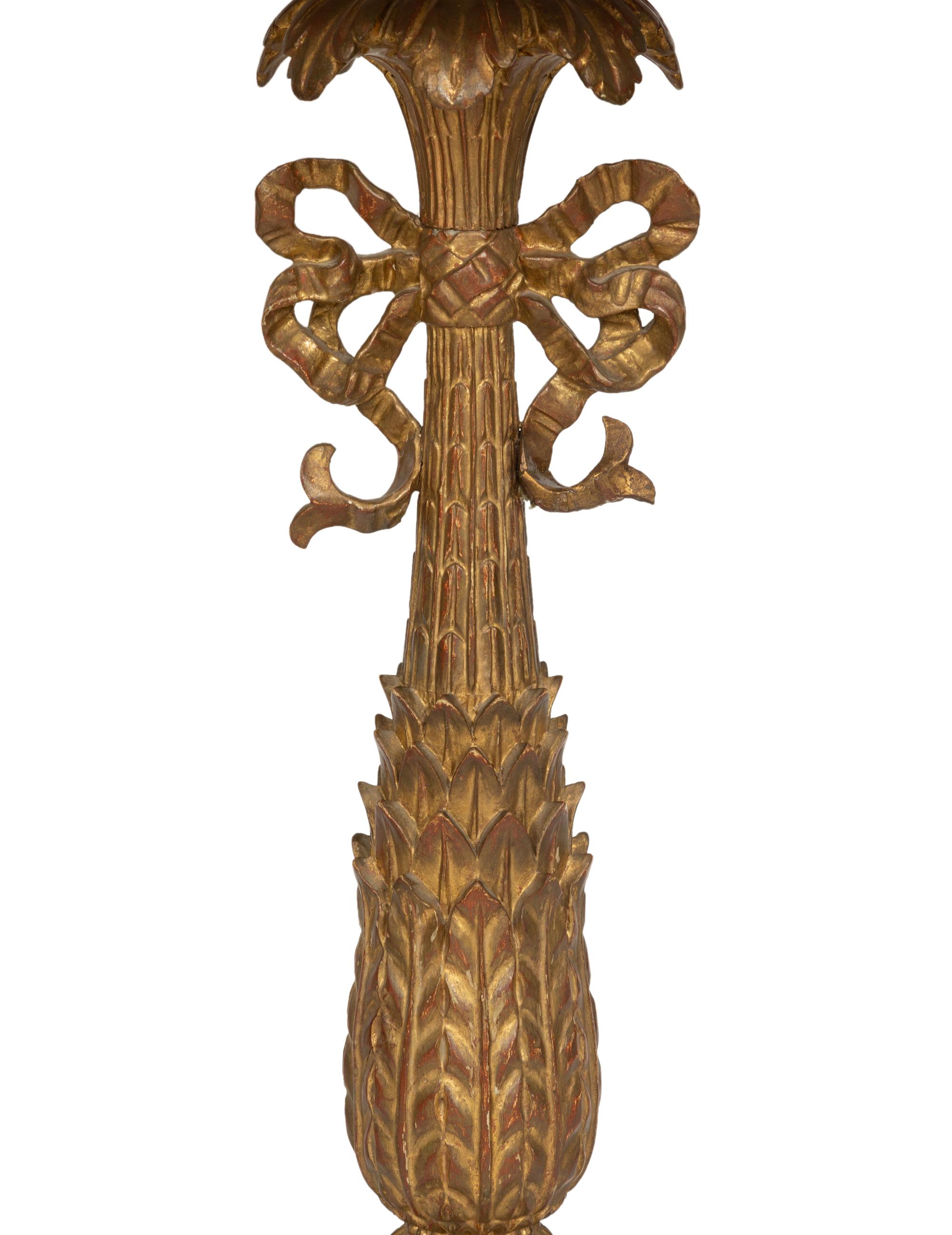 A Pair of XVI Style Carved Giltwood Lamps on Ebonized Pedestal Bases