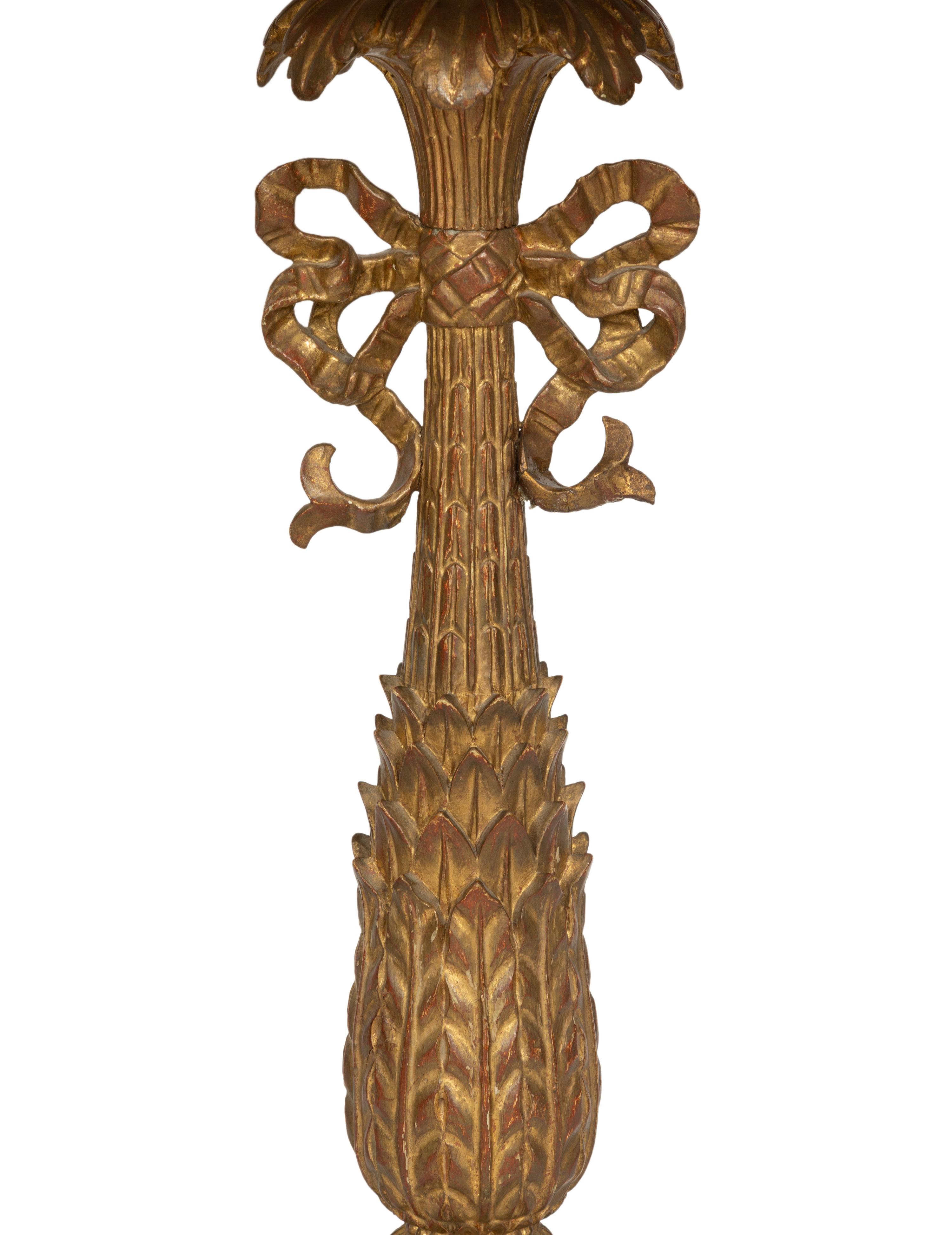 A Pair of XVI Style Carved Giltwood Lamps on Ebonized Pedestal Bases
