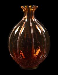 A Baccarat Harcourt Pitcher and a Baccarat Amber Glass Vase