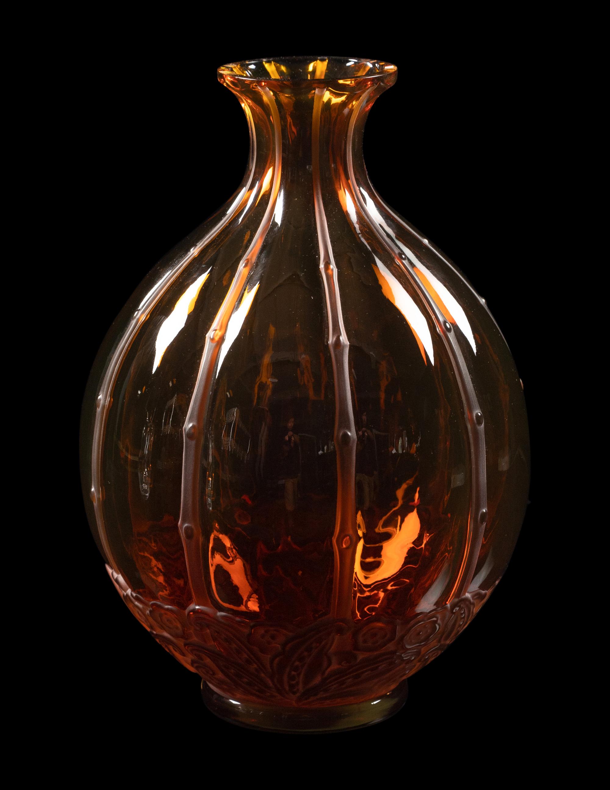 A Baccarat Harcourt Pitcher and a Baccarat Amber Glass Vase