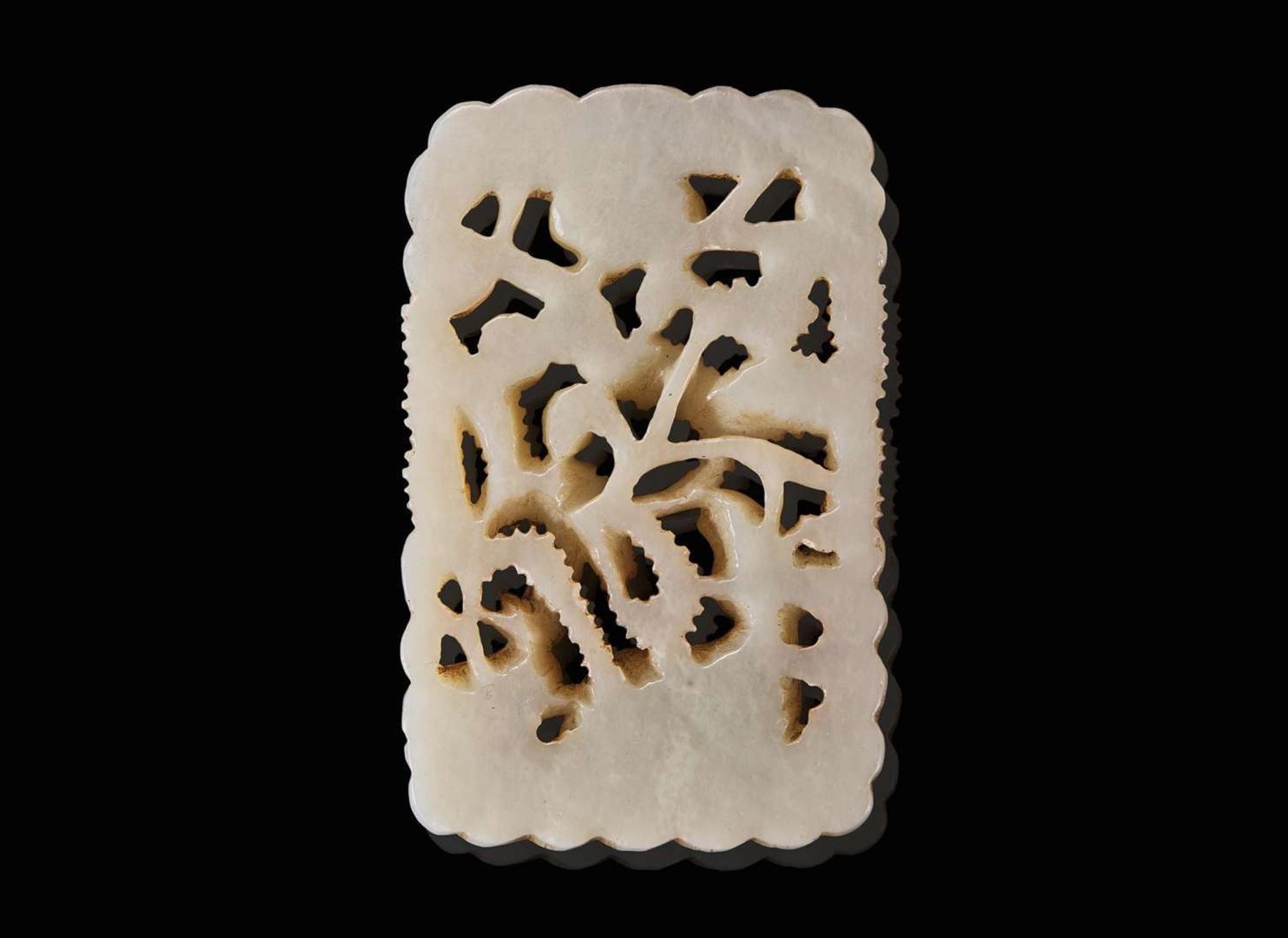 A Chinese carved white jade "Deer" fudiao plaque, possibly Ming dynasty 白玉浮雕牌飾 可能為明