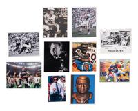 A Group Mike Ditka’s Restaurant Gift Shop Items Including Autograph Model Footballs Signed by Mike Ditka