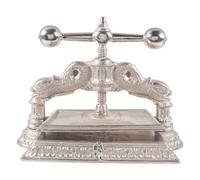 A Dolphin Form Silvered Metal Book Press