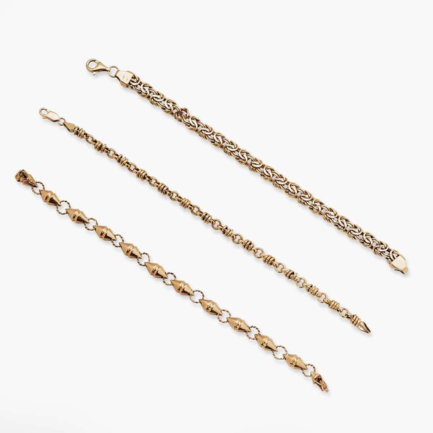A Trio of 14K Yellow Gold Bracelets
