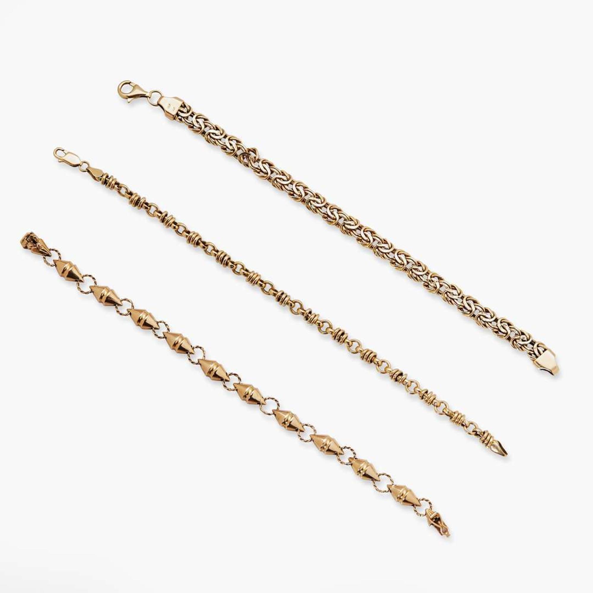 A Trio of 14K Yellow Gold Bracelets