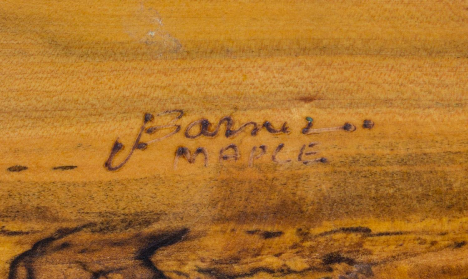 James Edward Barnes, WOOLWINE, VA, wood turned vessel, with an intentional break and inlaid geometric design repair