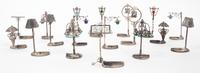 A Collection of 18 Italian Silver Place Card Holders Height 2 3/4 inches.