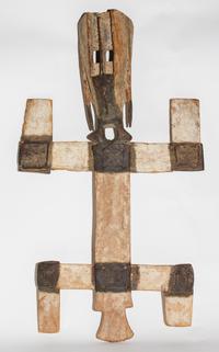 A Dogon Painted Kanaga Mask. Height 36 inches.