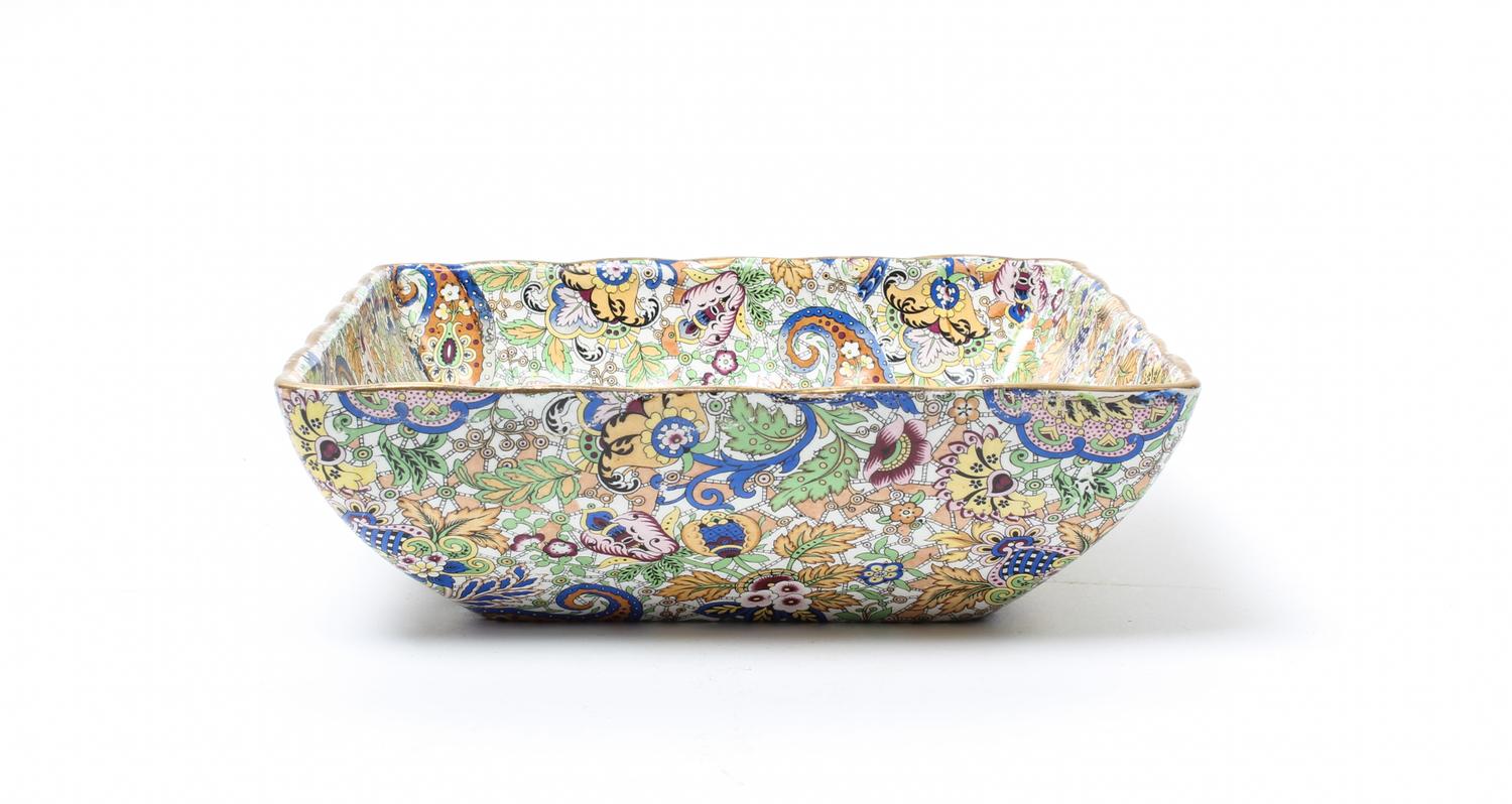 A Fenton Stoneware Bowl Width 9 inches.