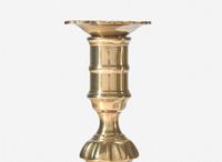 A group of ten George II scallop or petal-base brass candlesticks, England, 18th century