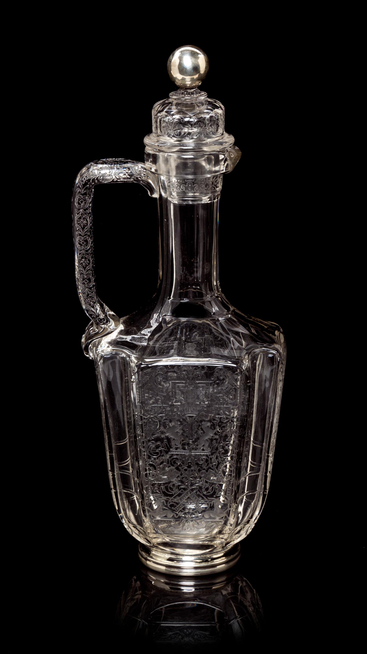 A Bohemian Wheel Cut Glass Ewer, Lobmeyr, Height 11 3/4 inches.