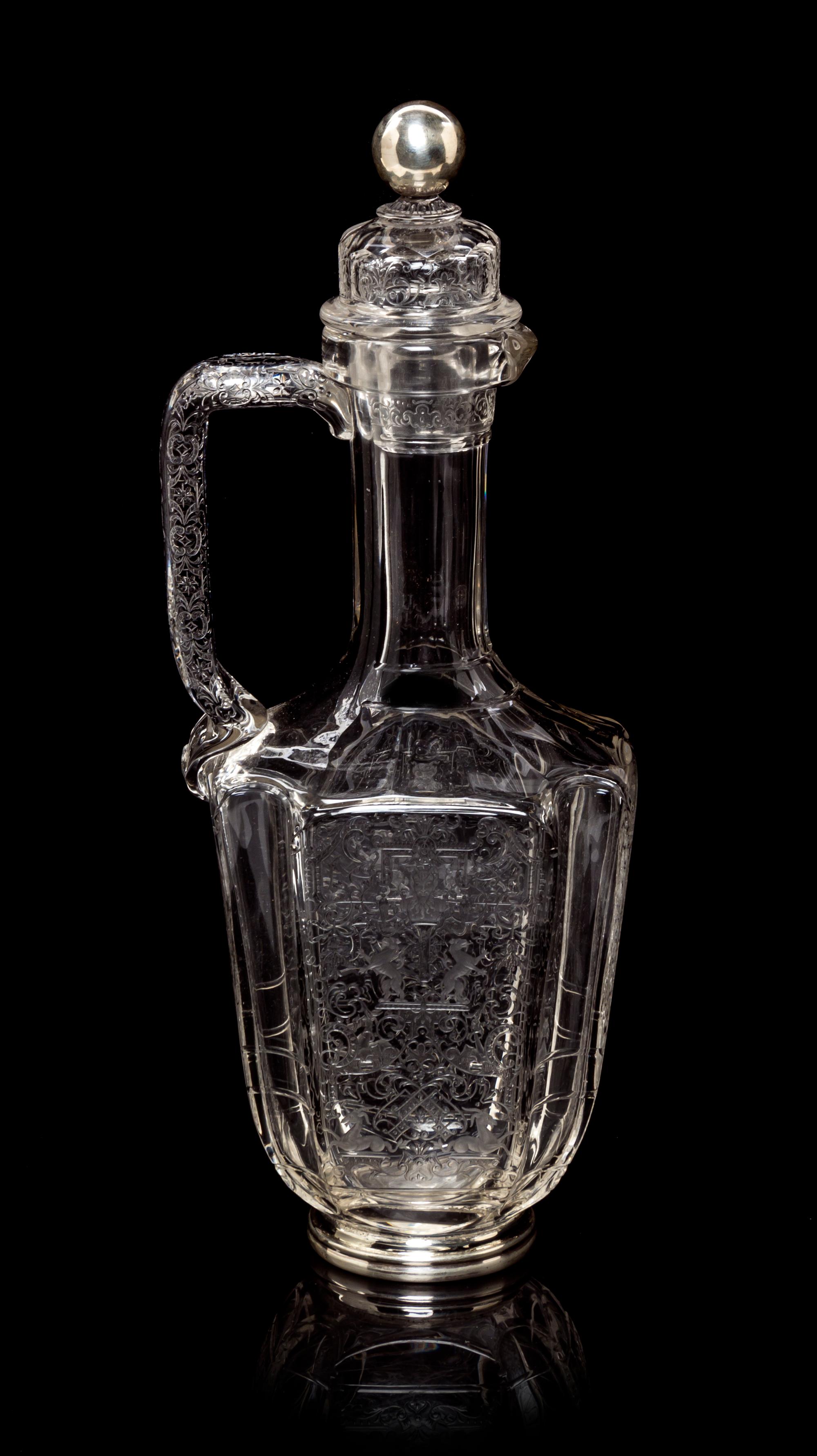 A Bohemian Wheel Cut Glass Ewer, Lobmeyr, Height 11 3/4 inches.