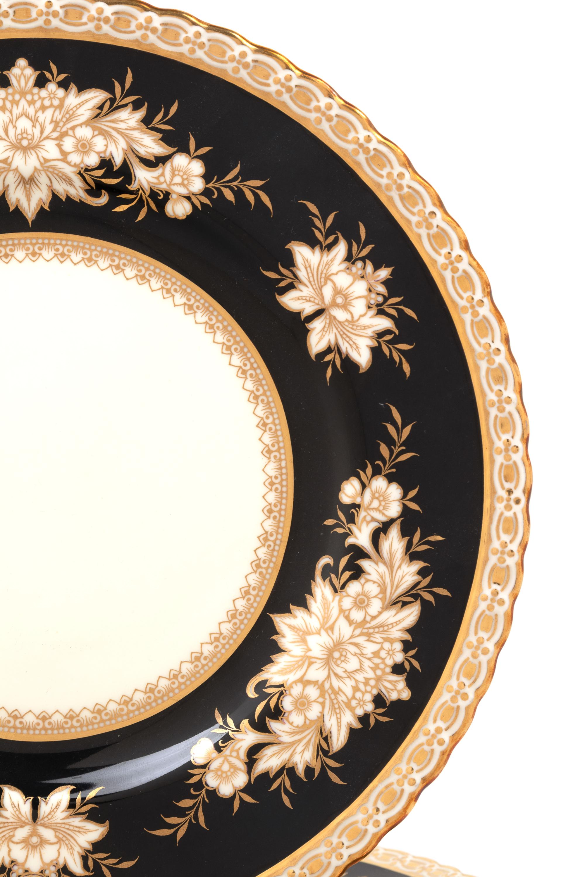 A Set of Fifteen Mintons Parcel Gilt Porcelain Service Plates