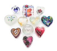 Eleven Heart Shaped Paperweights Diameter of largest 3 1/4 inches — 20TH CENTURY