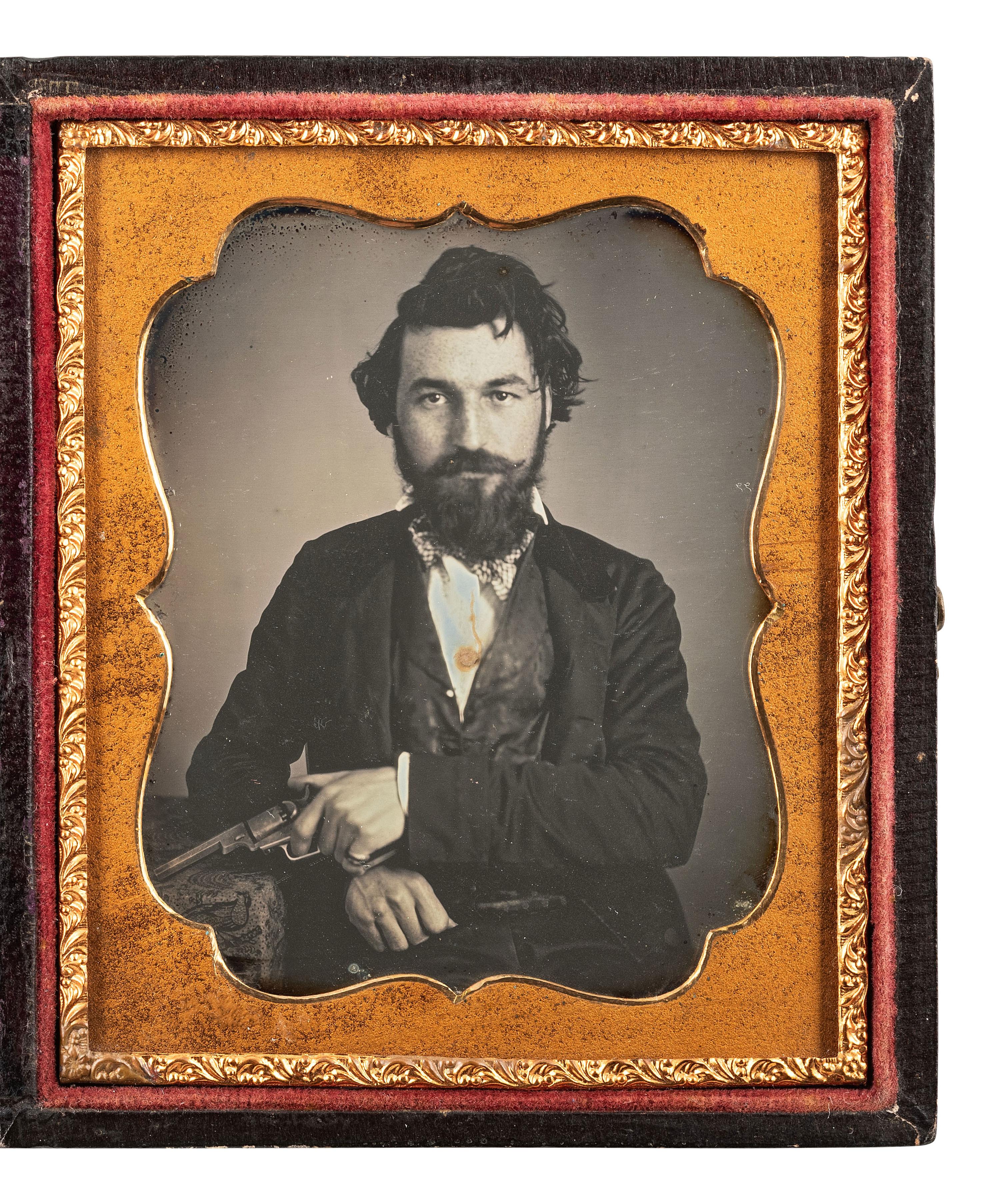 [MINING - EARLY PHOTOGRAPHY]. Sixth plate daguerreotype of a likely California gent holding a Colt "Baby Dragoon" and wearing a gold nugget stickpin.