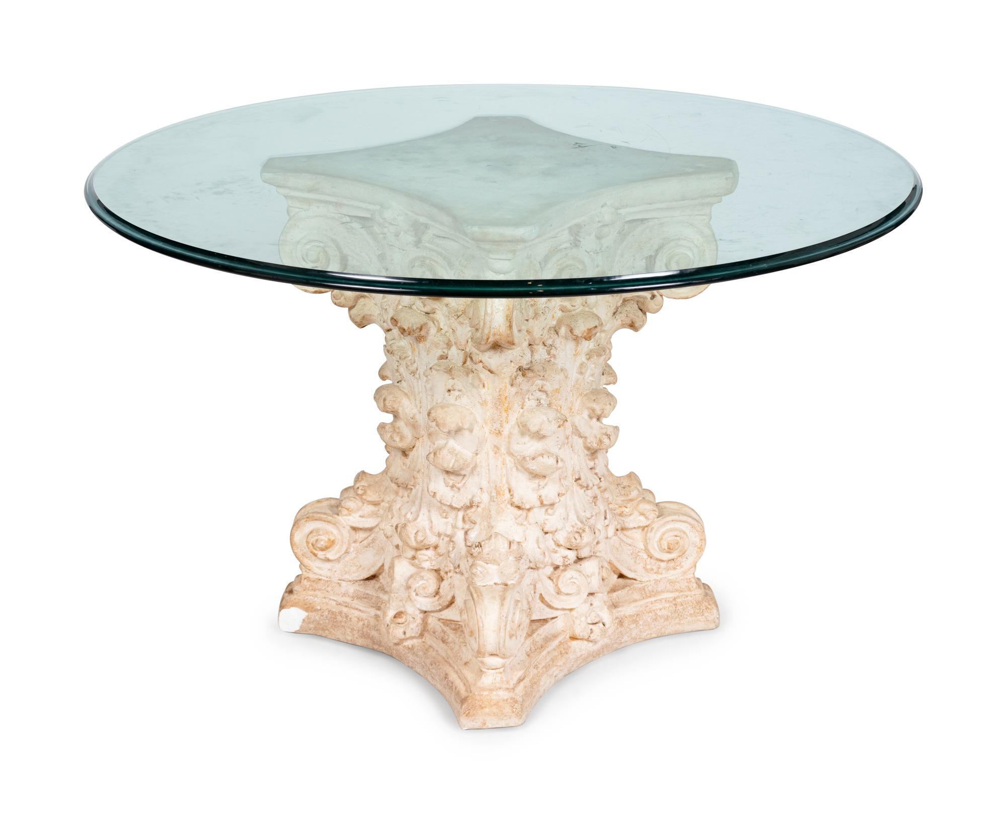 A Composition Column Capital and Glass Table