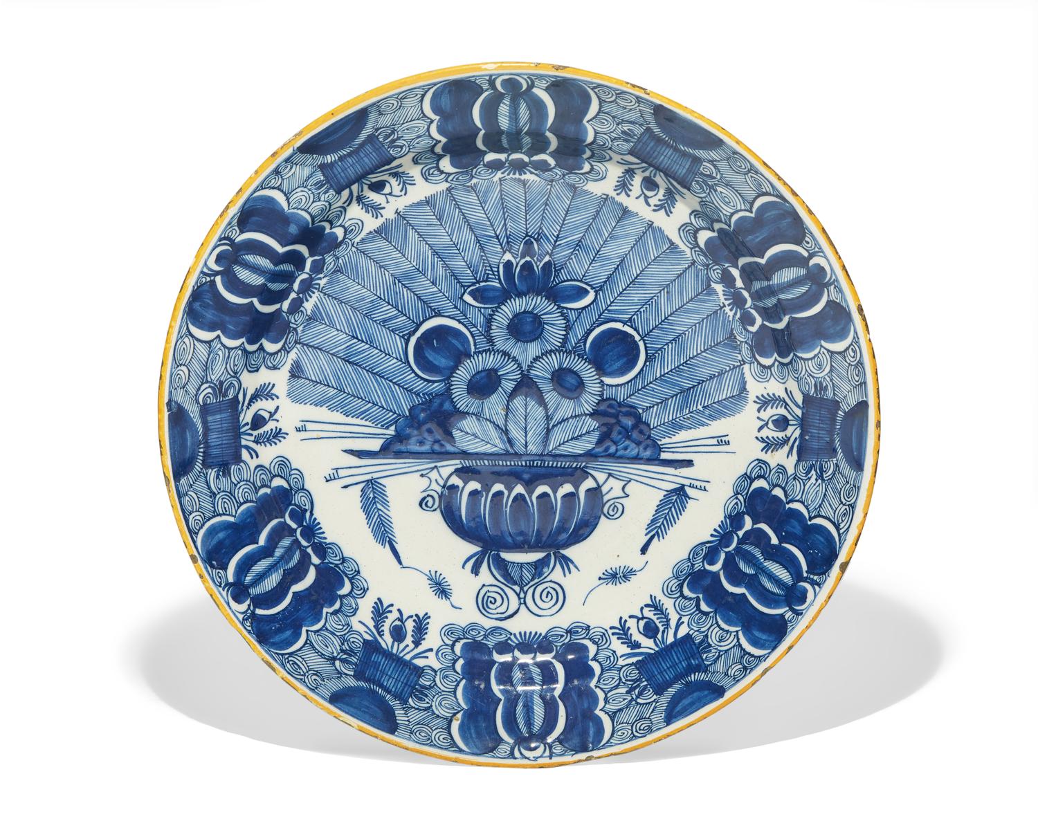 A Dutch Delft blue and white "Peacock" charger, De Klaauw, Delft, Netherlands, second half 18th century