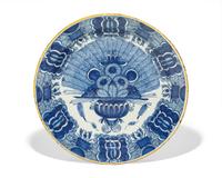 A Dutch Delft blue and white "Peacock" charger, De Klaauw, Delft, Netherlands, second half 18th century