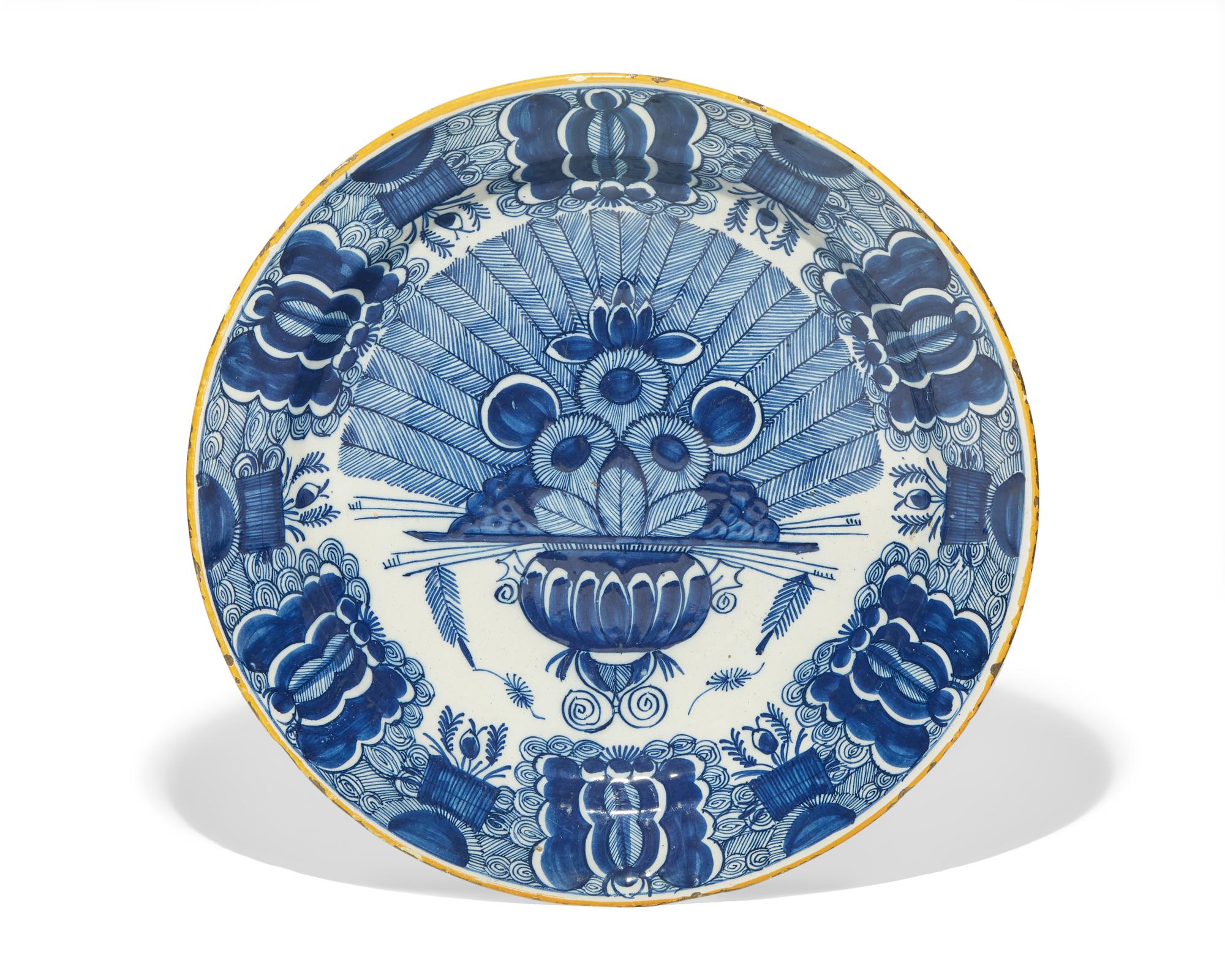 A Dutch Delft blue and white "Peacock" charger, De Klaauw, Delft, Netherlands, second half 18th century