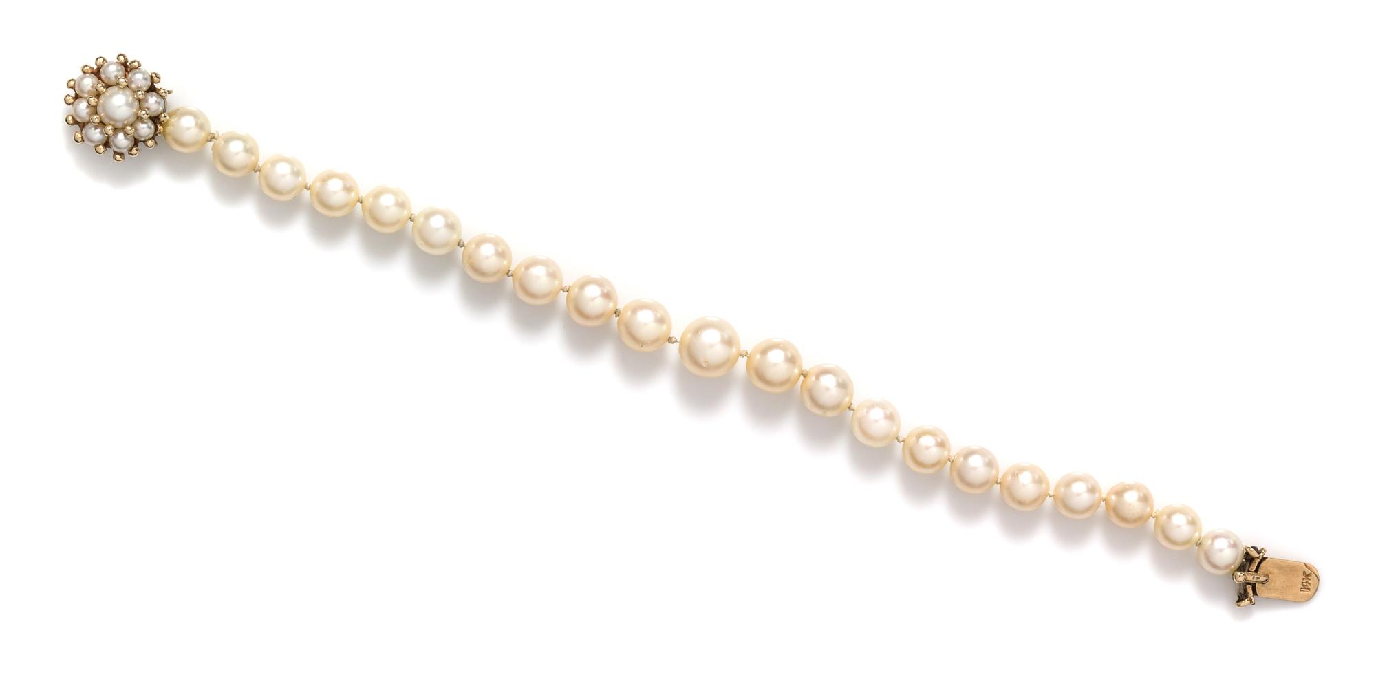 A 14 Karat Yellow Gold and Cultured Pearl Bracelet,