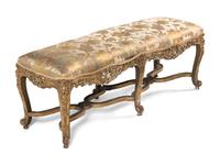 A Louis XV Carved Giltwood Window Bench