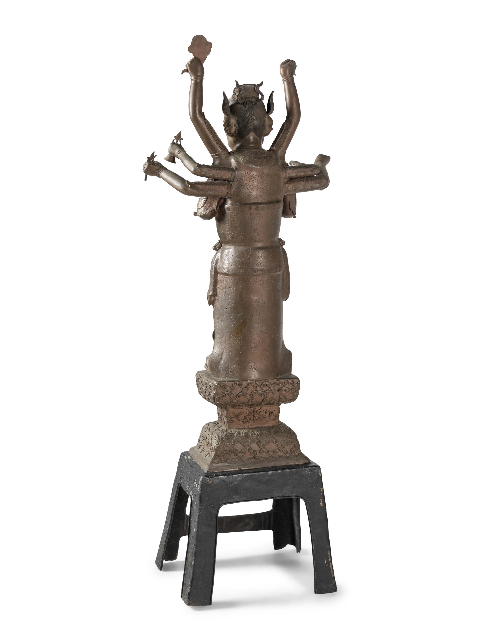 A Large Chinese Bronze Figure of a Deity