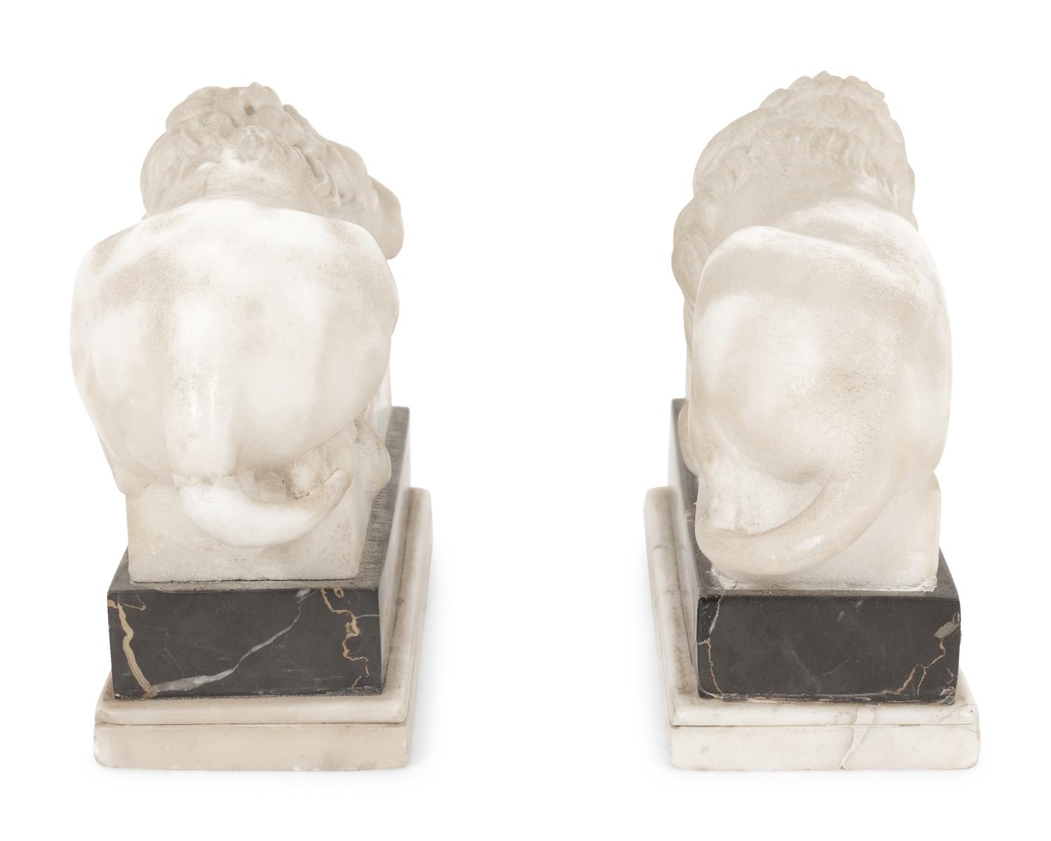 A Pair of Marble Recumbent Lion Bookends