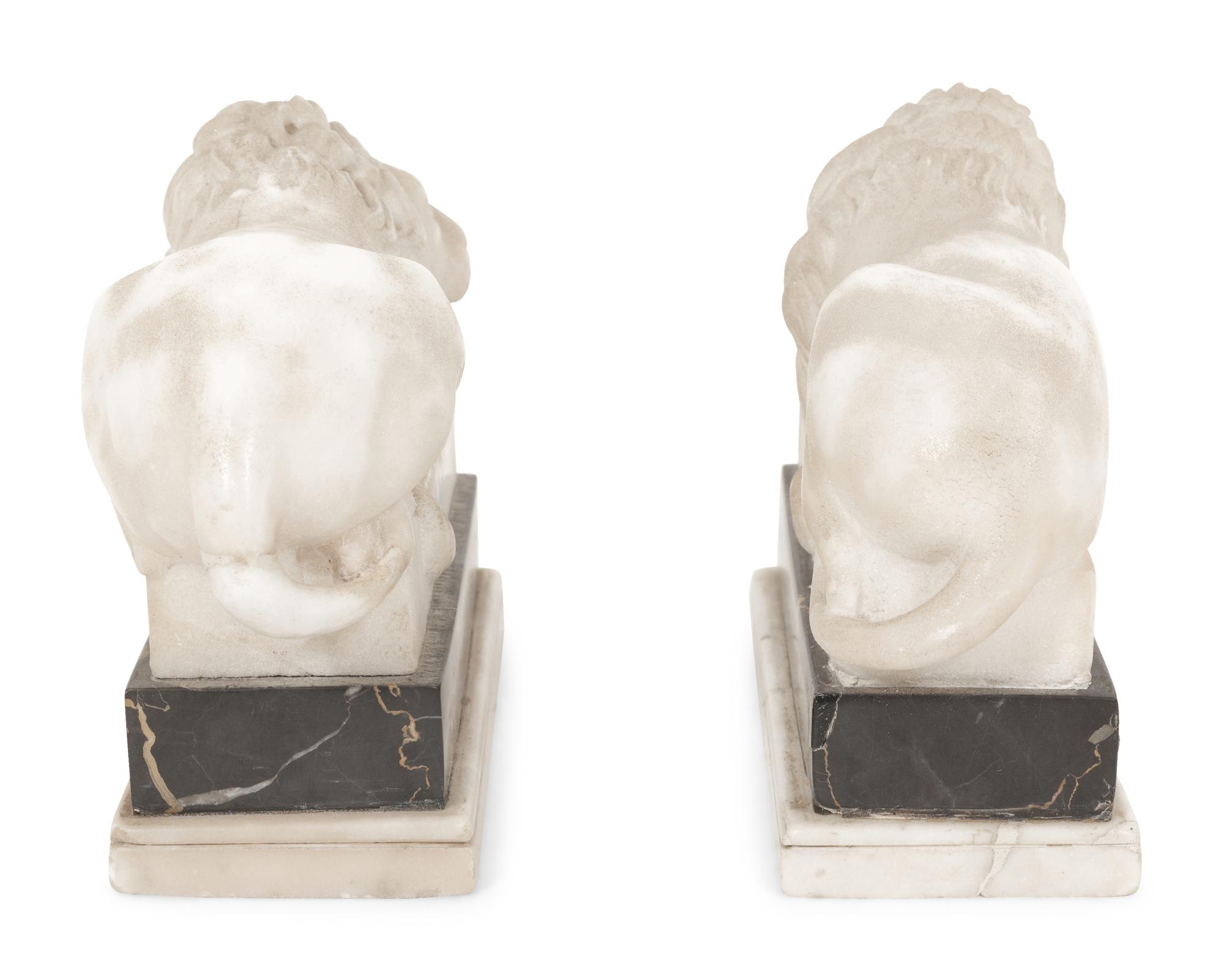 A Pair of Marble Recumbent Lion Bookends