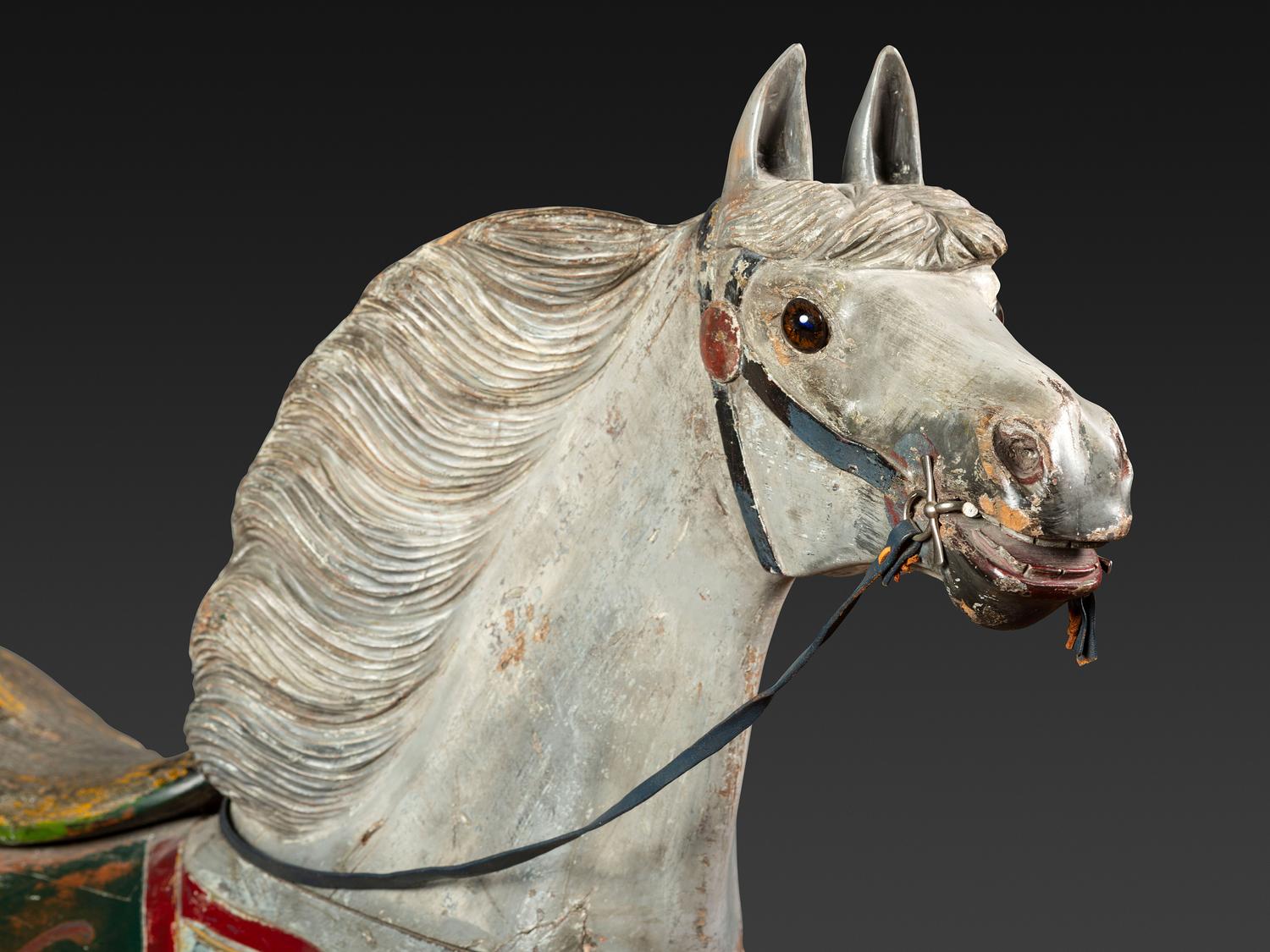A Herschell-Spillman Carved and Painted Wood Carousel Horse