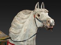 A Herschell-Spillman Carved and Painted Wood Carousel Horse