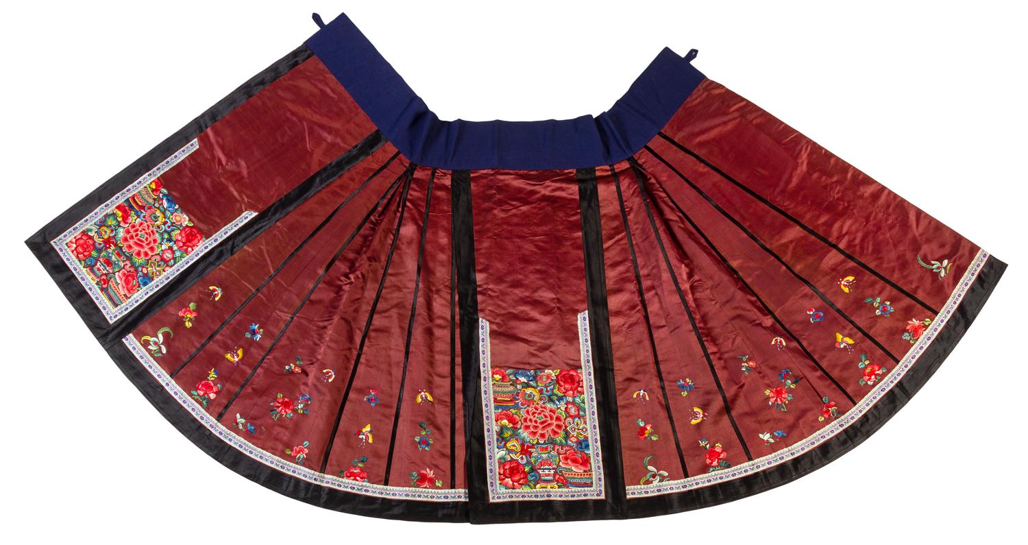 A Brown Ground Embroidered Silk Apron Skirt Length 37 1/4 inches. — 20TH CENTURY