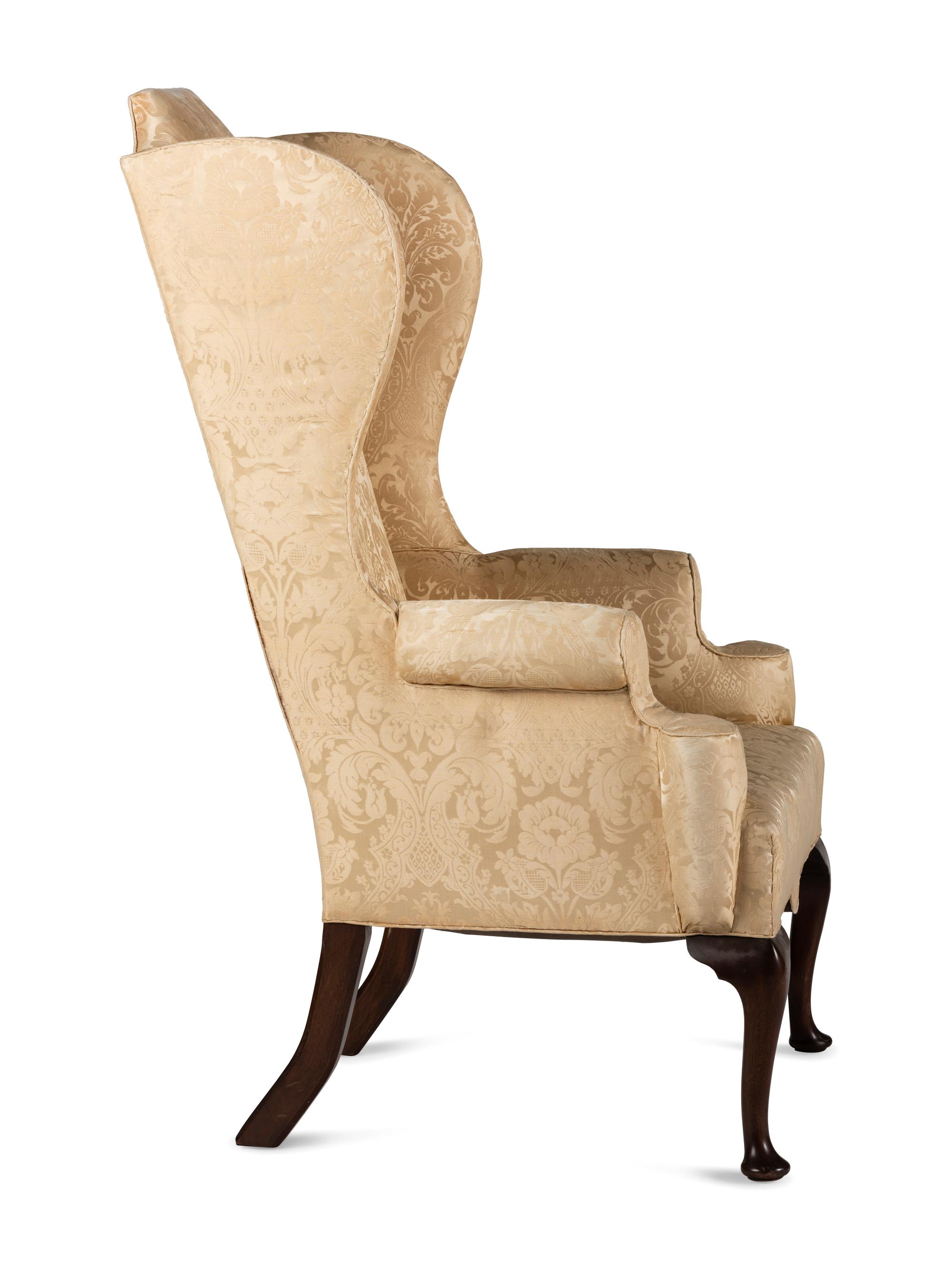 A Queen Anne Style Upholstered Pad Foot Easy Chair