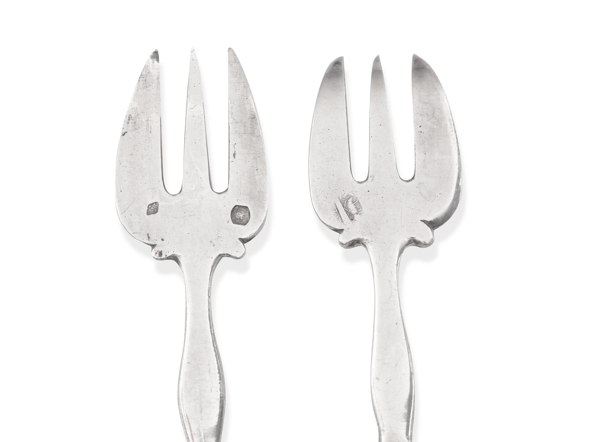 A Set of Twelve French Silver "Baguette and Shield" Oyster Forks