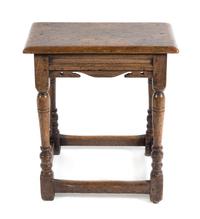 A Jacobean Style Oak Stool Height 22 3/4 x width 19 3/4 x depth 9 7/8 inches. — 20TH CENTURY