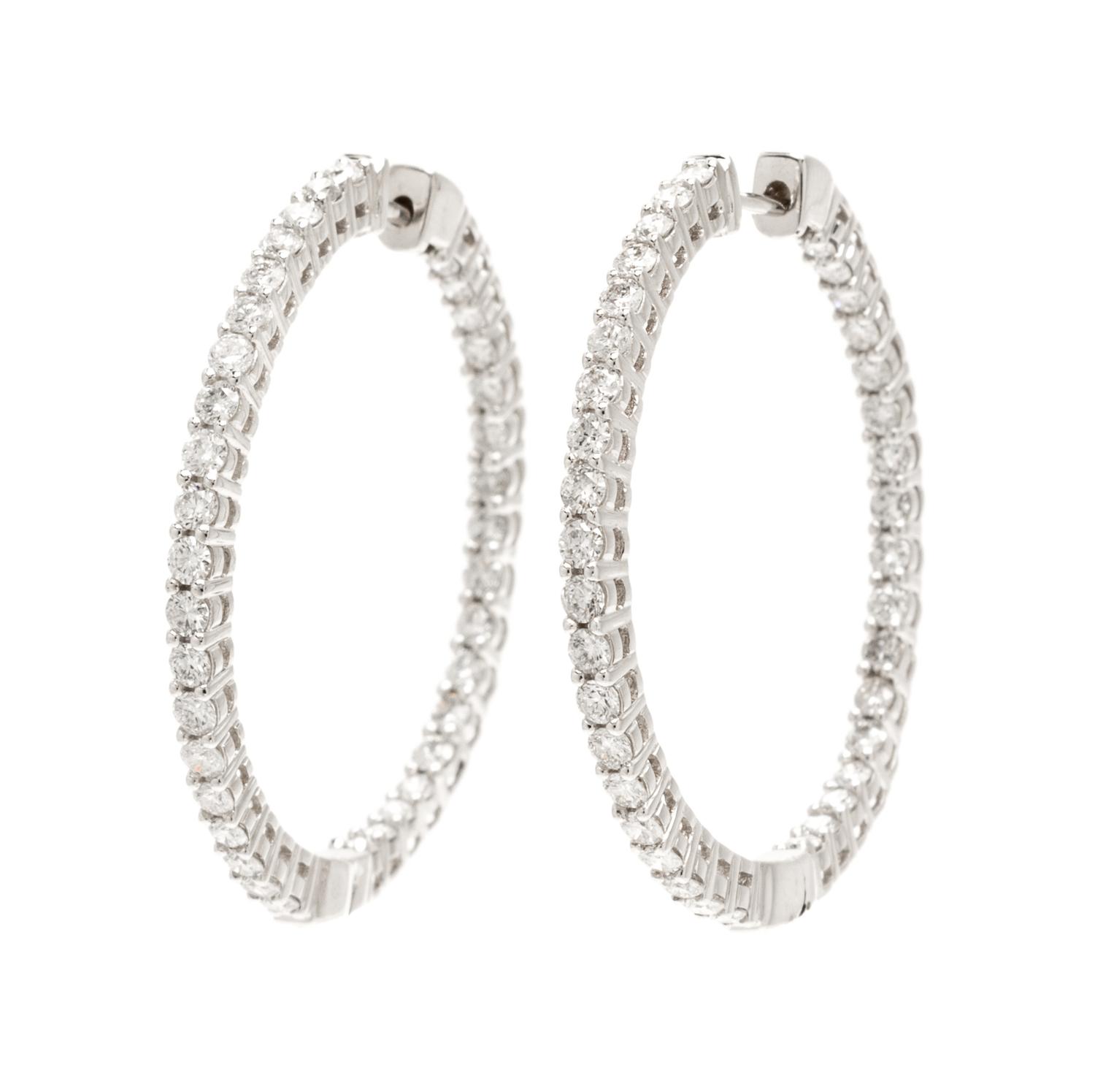 A Pair Of 14 Karat White Gold and Diamond Hoop Earrings, 4.20 dwts.