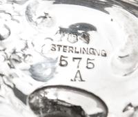 Two Pairs of Silver Casters, , comprising an Edwardian cylindrical pair, Harrison Bros. & Howson, Sheffield, 1902 and an American balus