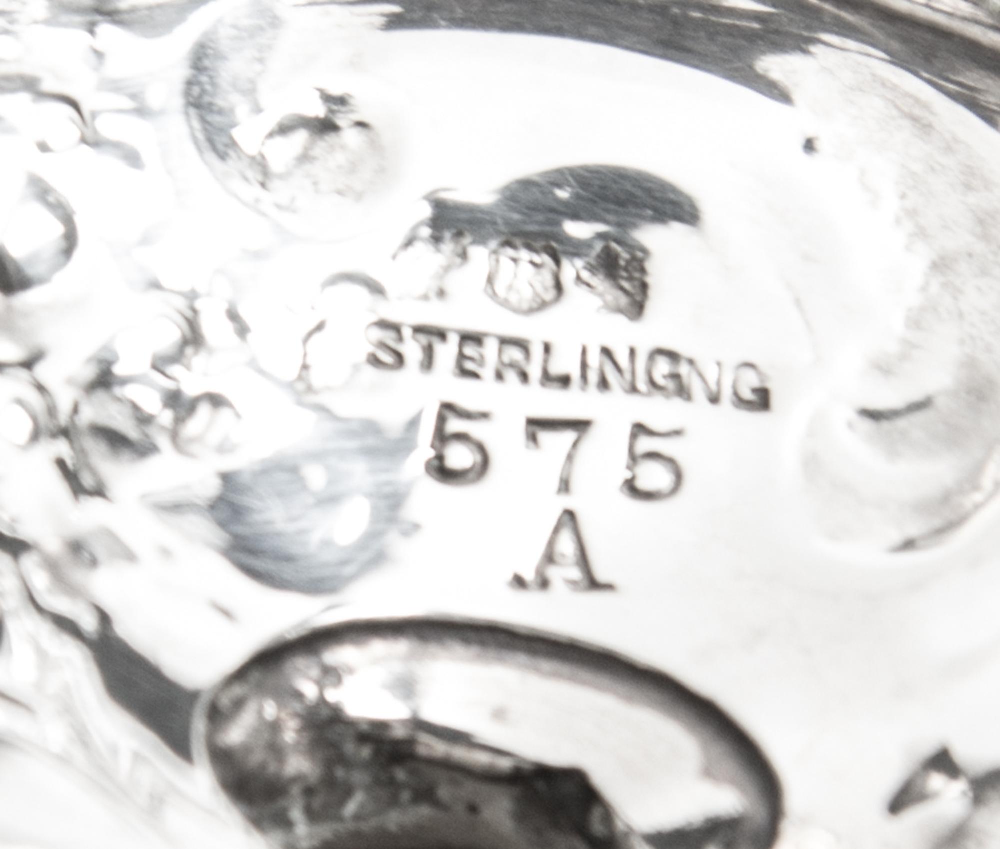 Two Pairs of Silver Casters, , comprising an Edwardian cylindrical pair, Harrison Bros. & Howson, Sheffield, 1902 and an American balus