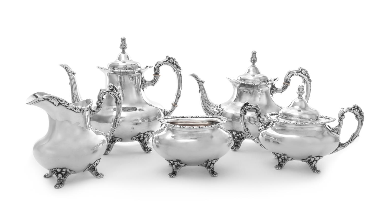 An American Silver Five-Piece Tea and Coffee Service, Fisher Silversmiths Inc., Jersey City, NY, comprising a teapot, coffee pot, cream