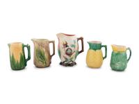 A Group of Nine Majolica Pitchers