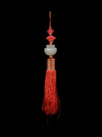 A White Jade Purse-Form Pendant