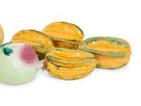 A Collection of Fifteen Miscellaneous Glazed Ceramic Fruits and Vegetables