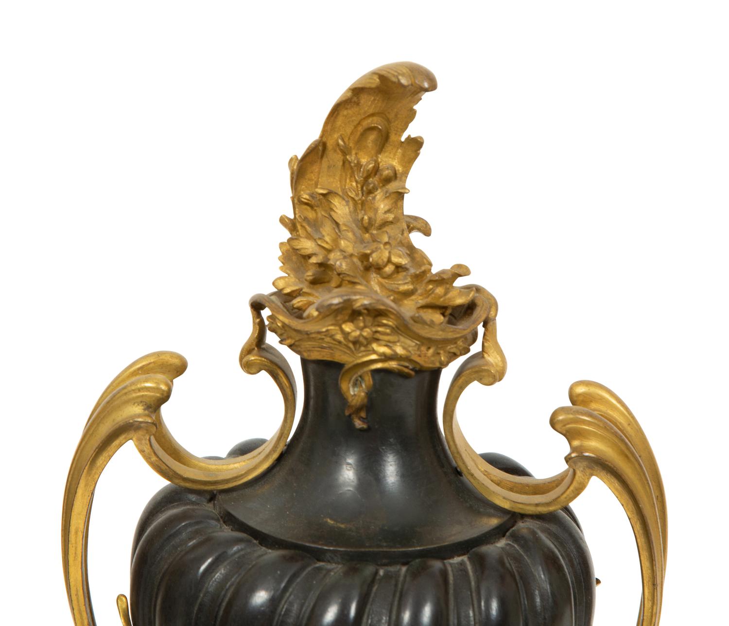 A Pair of French Gilt and Patinated Bronze Urns