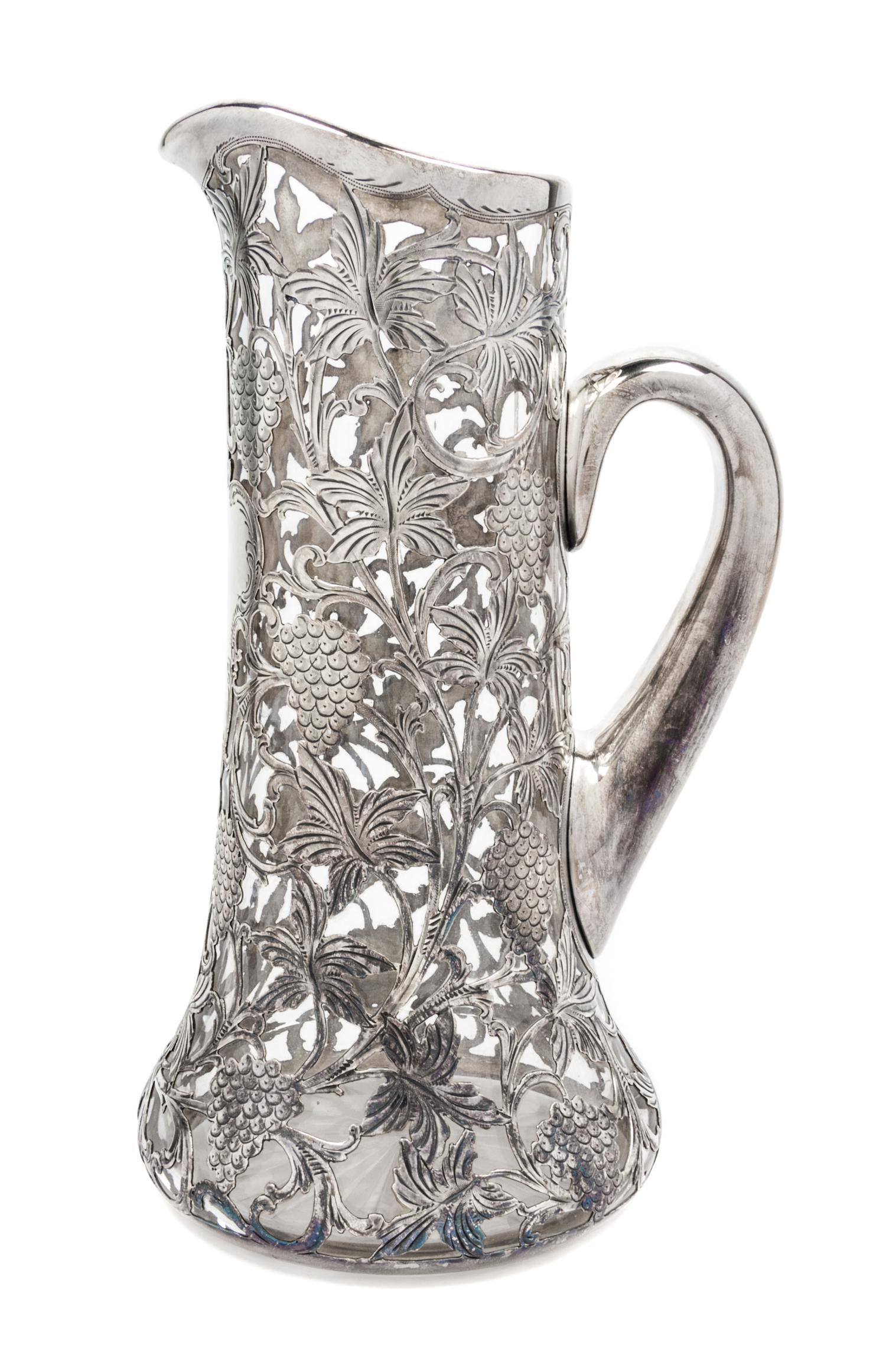 A Silver Overlay Glass Pitcher Height 11 1/4 inches.