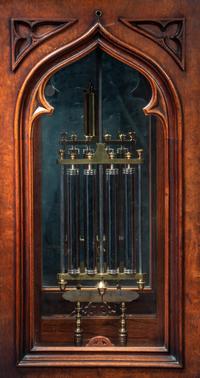 A Gothic Revival Carved Mahogany Tall Case No. 24 Astronomical Regulator
