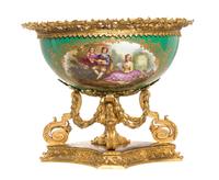 A Louis XVI Style Porcelain and Gilt Bronze Mounted Center Bowl, Width overall 19 inches.