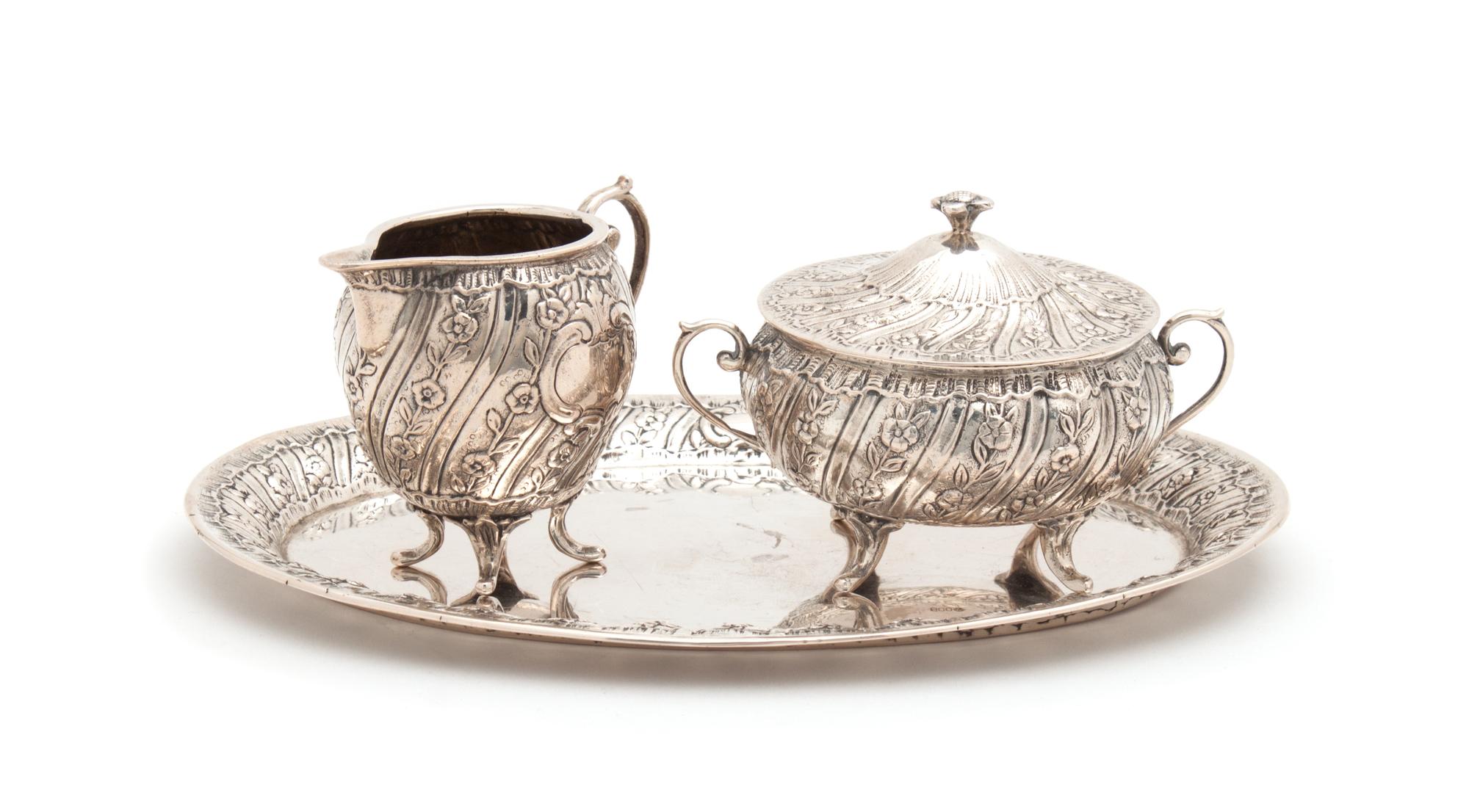 A German Silver Covered Sugar and Creamer Set with Tray Width of tray 8 1/2 inches. — 20TH CENTURY