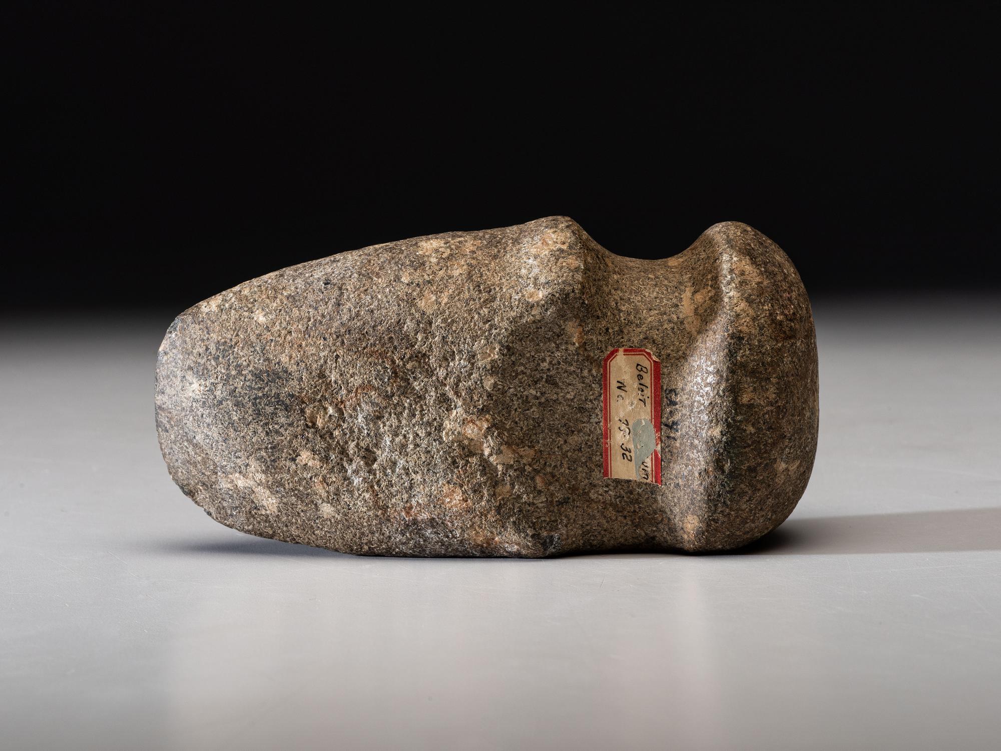 A Porphyry 3/4 Groove Axe