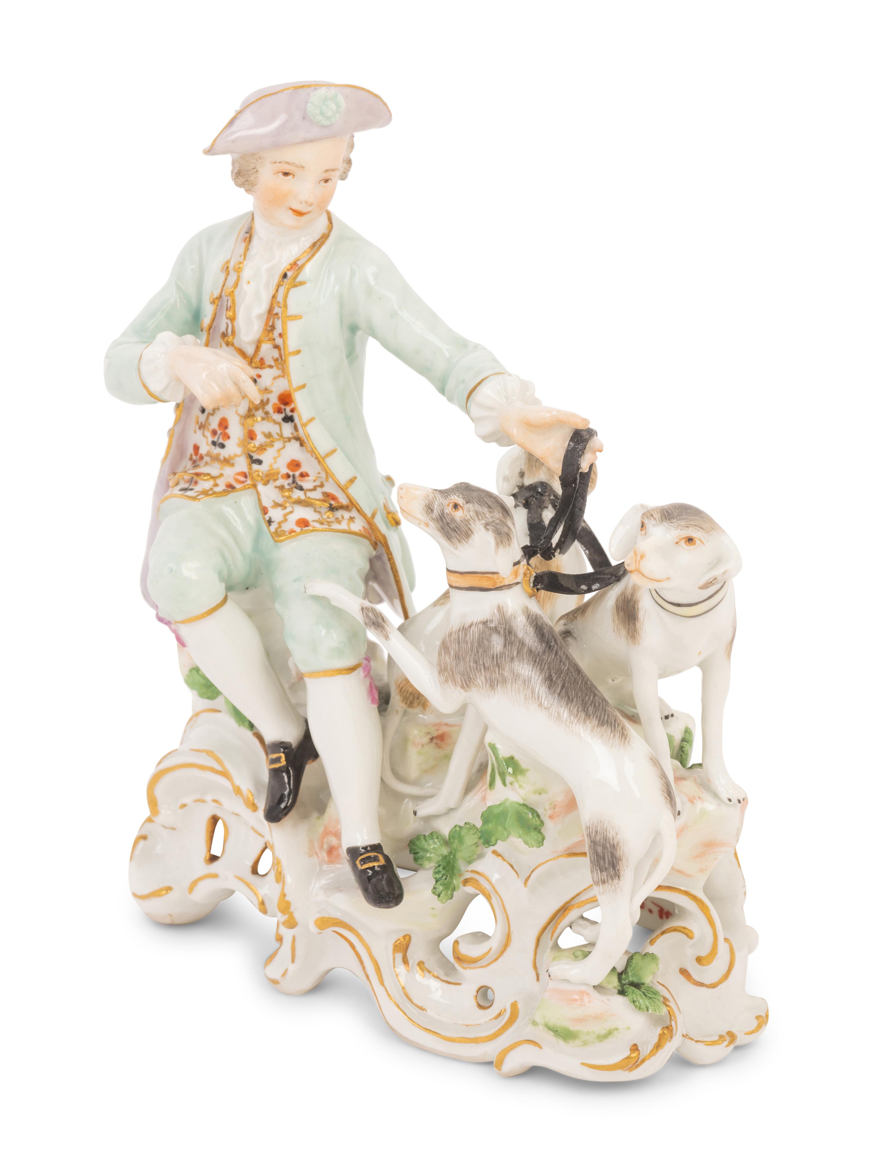 A Meissen Porcelain Figural Group of a Man with Hounds